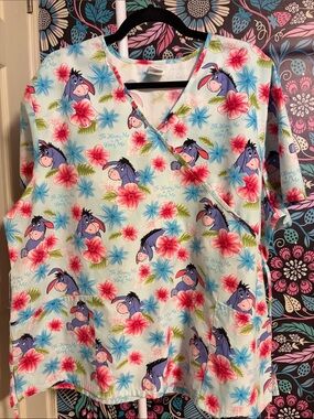 Disney Eeyore Floral Wrap Scrub Top - Light Blue, Pink & Blue